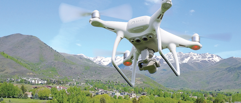 drone flying over neighborhood