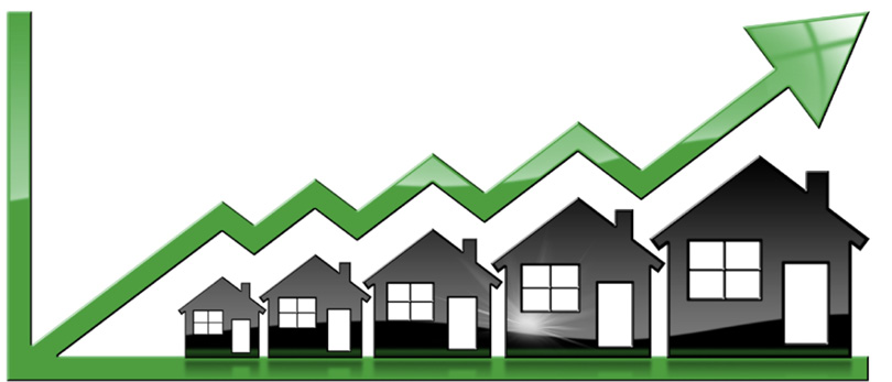 graph with arrow rising over houses