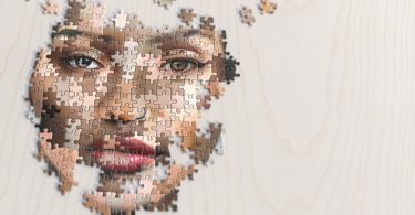 puzzle mosaic of face