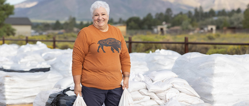 Lisa Paffrath, CRS, helping with sandbags