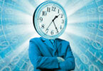 man with clock for a head