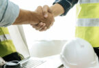 builder shaking hand with person
