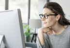 woman looking at computer