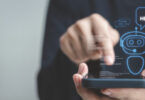 finger pointing at AI app on phone