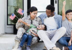 military family sitting on steps