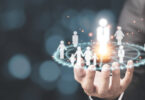 hand holding digital sphere of influence