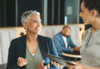 older woman mentoring a younger woman